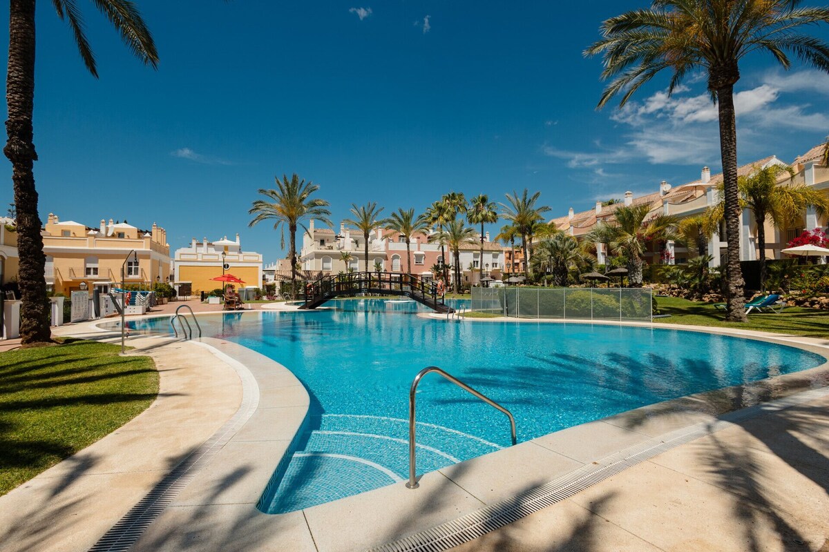Relax and unwind by the beautiful community pool