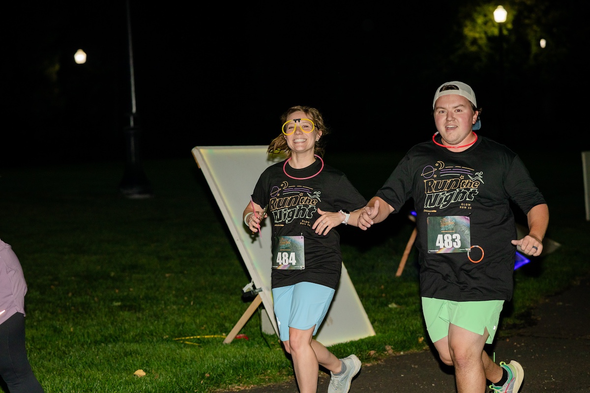 adults running at night