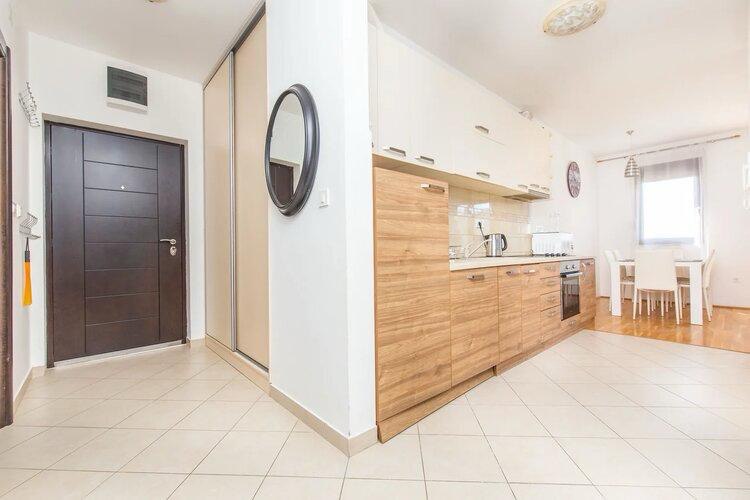 Two-Bedroom Apartment with Sea View in Podmaine District 2