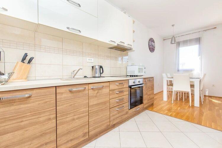 Two-Bedroom Apartment with Sea View in Podmaine District 3