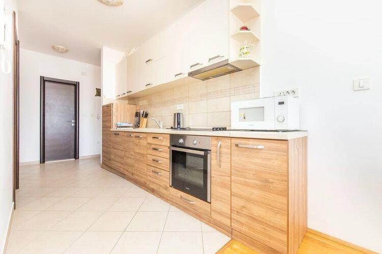 Two-Bedroom Apartment with Sea View in Podmaine District 4