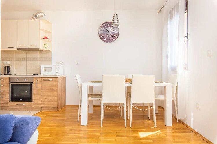 Two-Bedroom Apartment with Sea View in Podmaine District 5