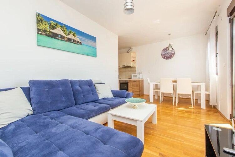 Two-Bedroom Apartment with Sea View in Podmaine District 7