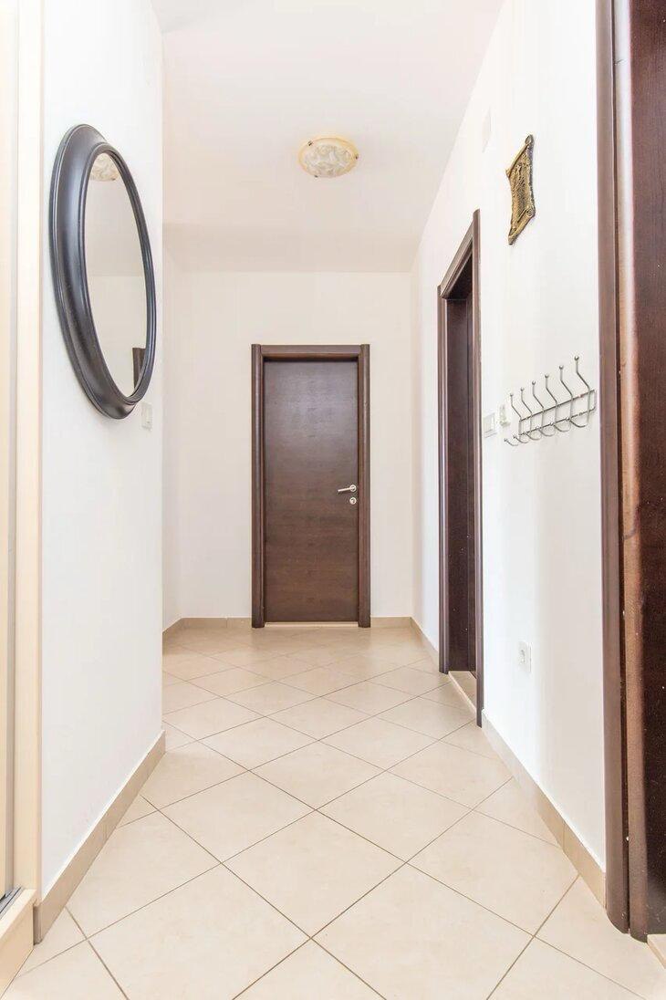 Two-Bedroom Apartment with Sea View in Podmaine District 8