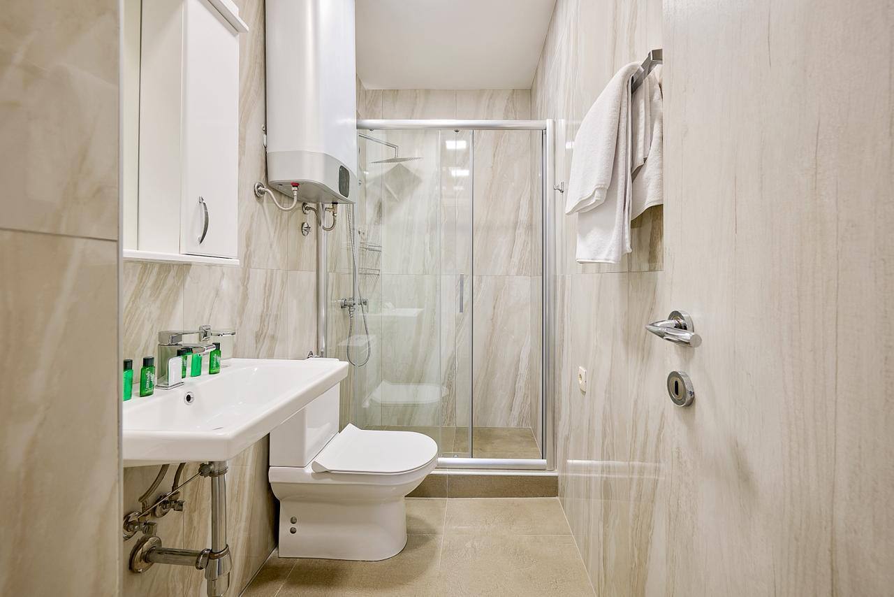 Modern 1-Bedroom Apartment with Sea View and Pool in Becici 8
