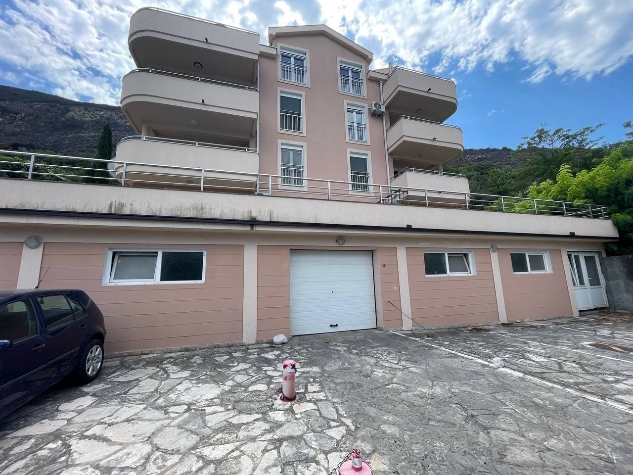 Parking space + storage room in underground garage, Njivice (Sutorina, Herceg Novi)