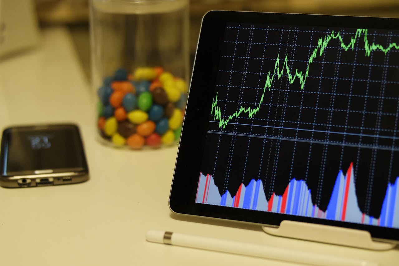 White Android Tablet Turned on Displaying a Graph. Photo by Burak The Weekender on pexels.com