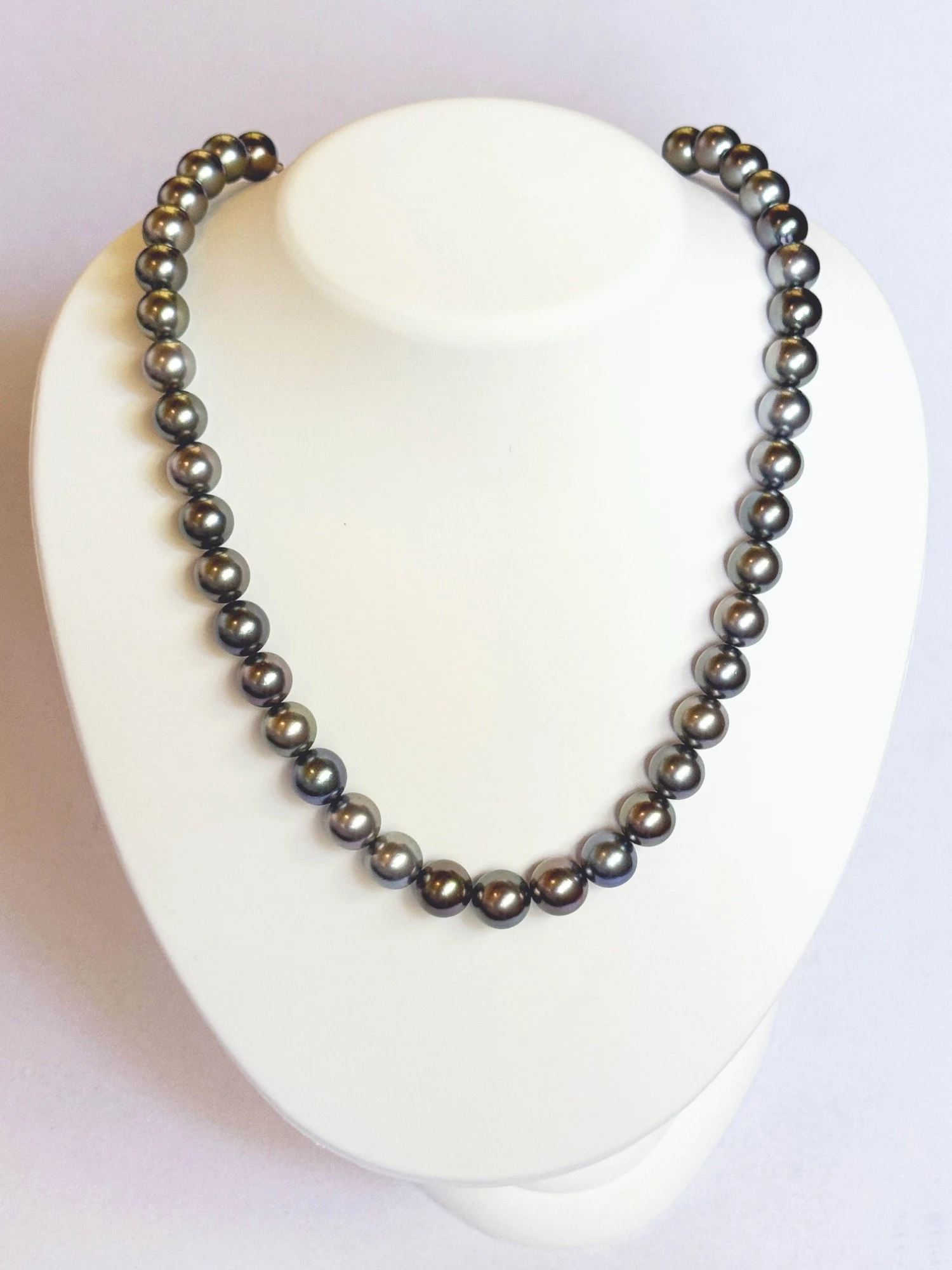 10–11.3mm Tahitian Pearl Necklace on a display bust