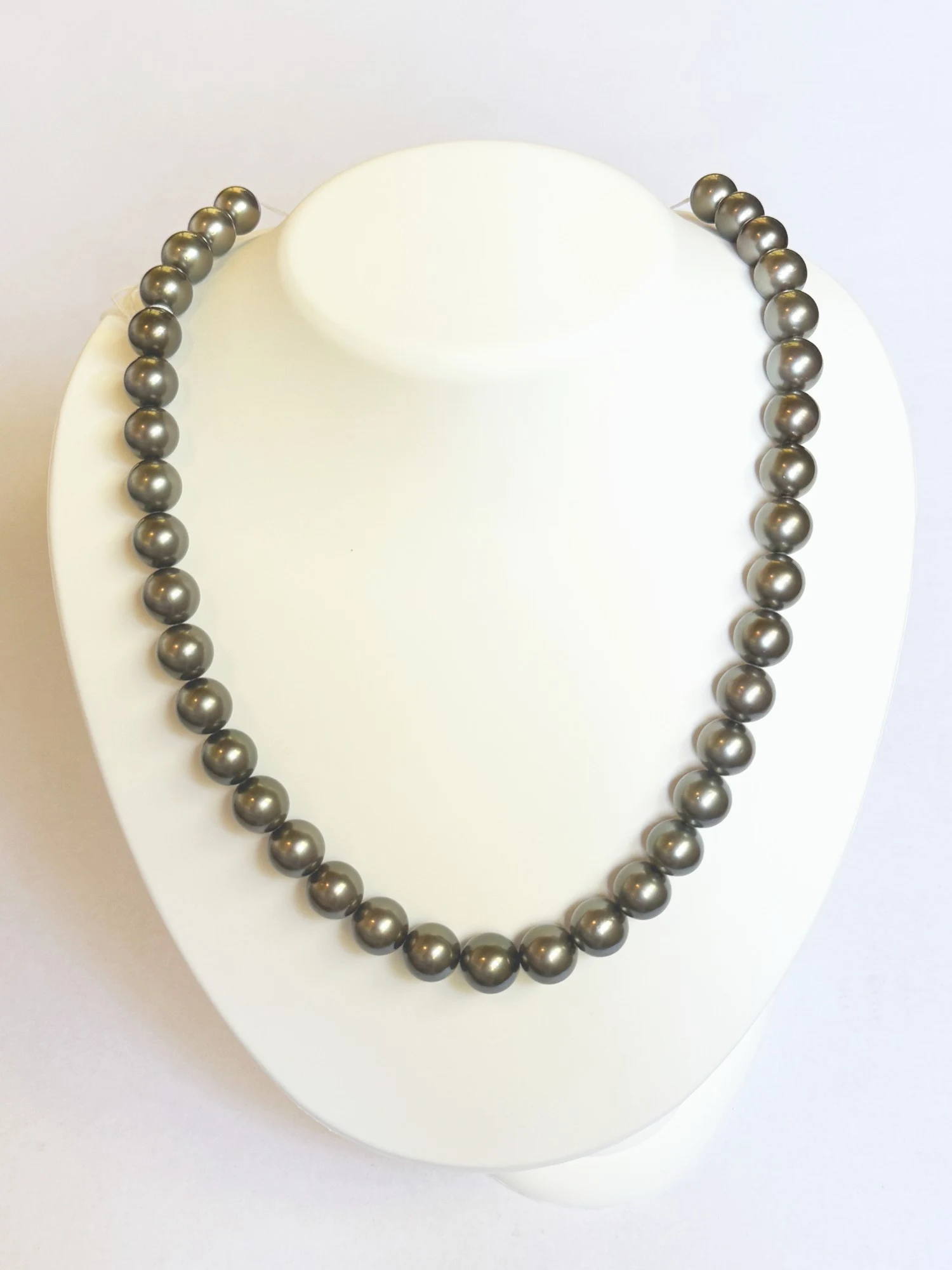 10.2–12.2mm Tahitian Pearl Necklace on a display bust
