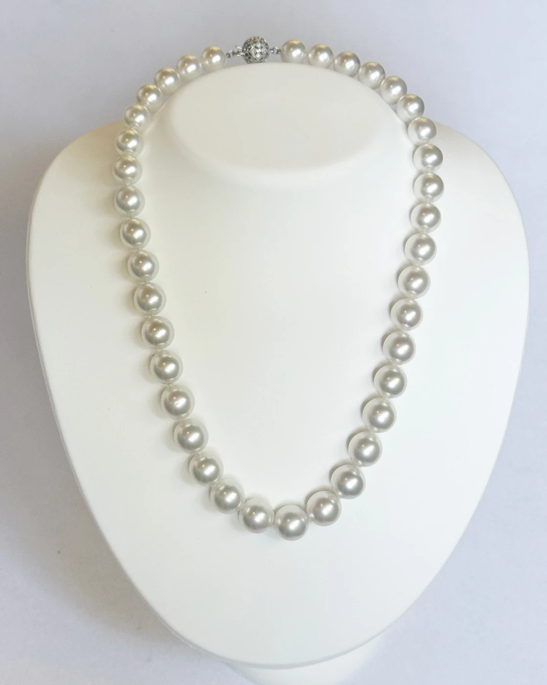 9.5–12mm White South Sea Pearl Necklace on a display bust