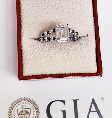 Emerald Cut Diamond and Sapphire Ring