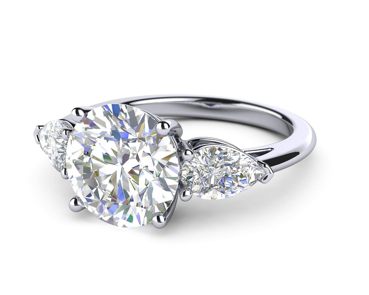 3.0 Carat Round Brilliant Diamond Flanked by Pear Cuts in Platinum