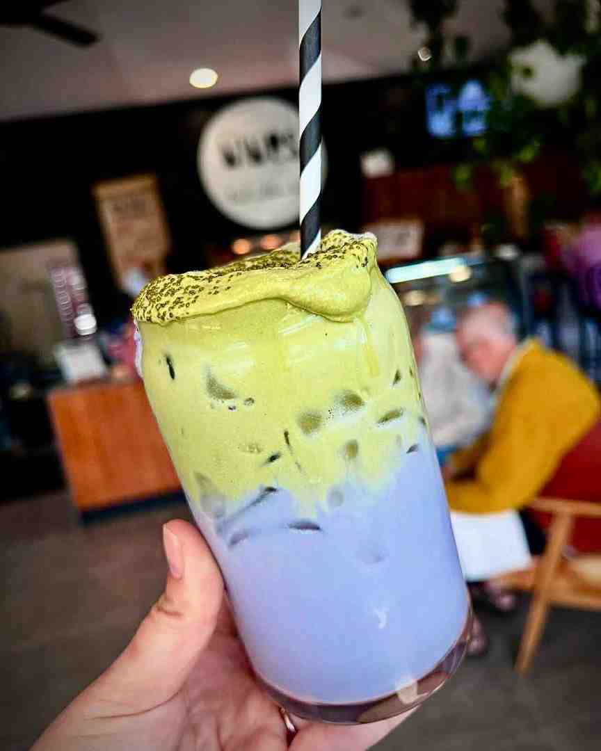 Chilled green matcha layered with taro cold foam, served at The Nines Café, Maroochydore