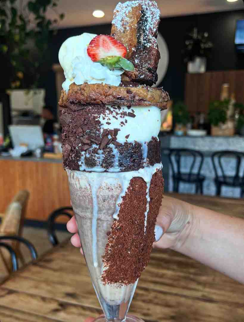 The Nines' Comeback shake, a massive chocolate fudge freakshake overflowing with ice cream brownie and churros one of the most indulgent refreshing summer beverages. The Nines' Comeback shake, a massive chocolate fudge freakshake overflowing with ice cream brownie and churros one of the most indulgent refreshing summer beverages.