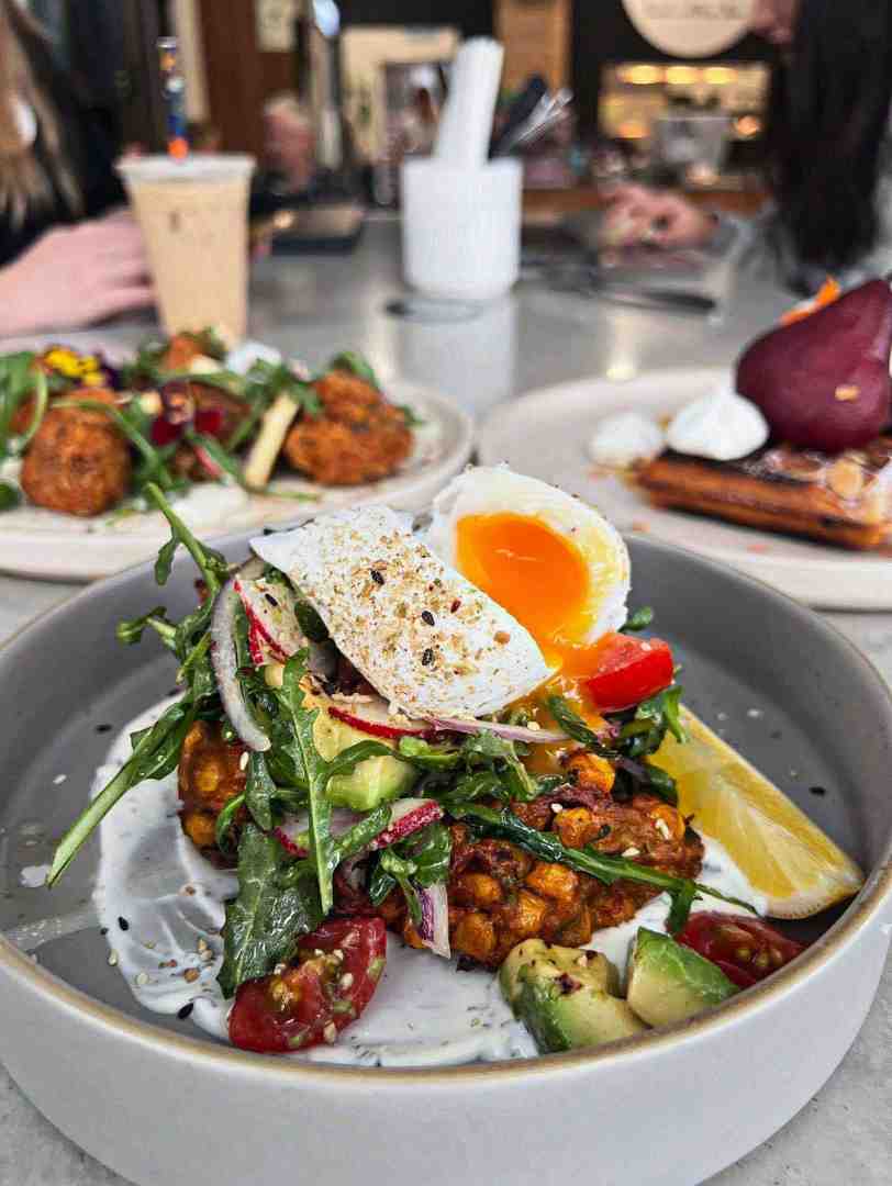 A colourful spread of dishes and drinks from The Nines - Cafe for meetings