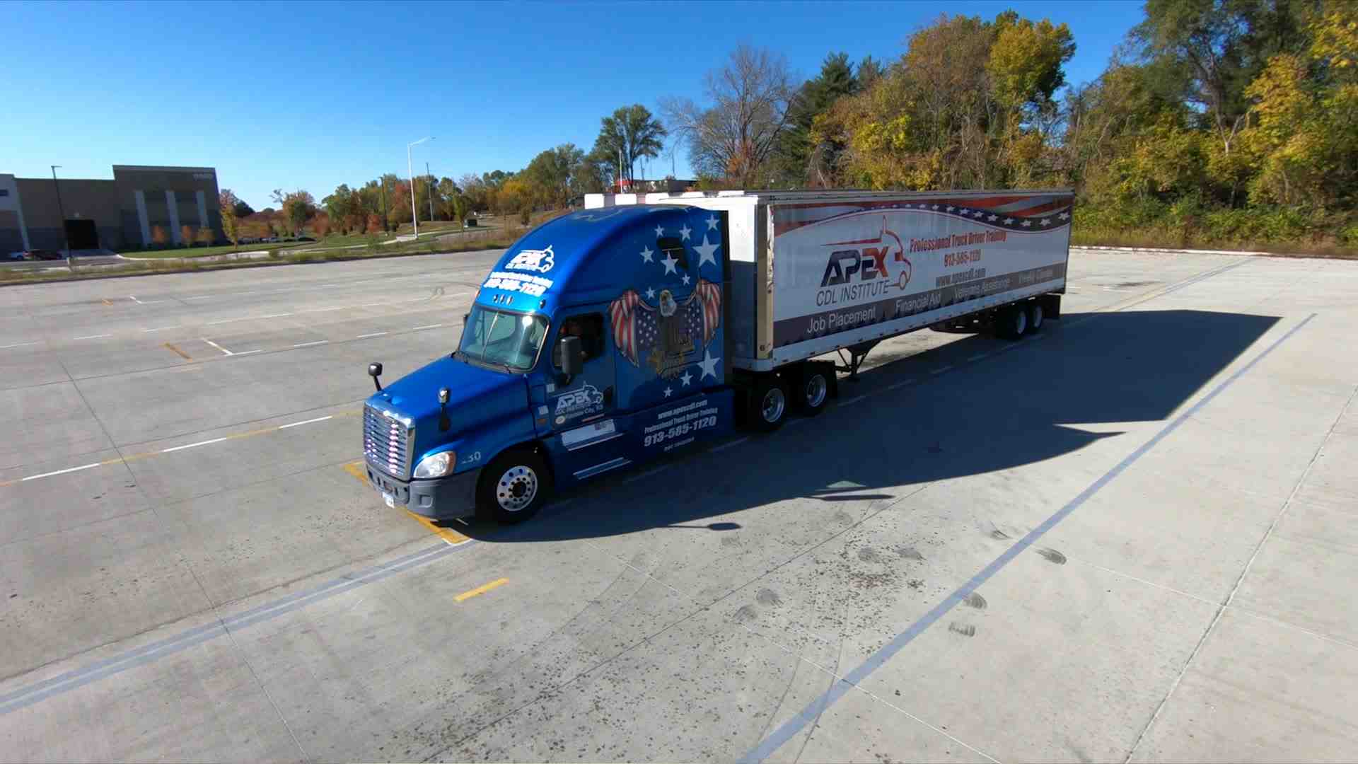 of a student driver in the semi truck on the range - commercial class a