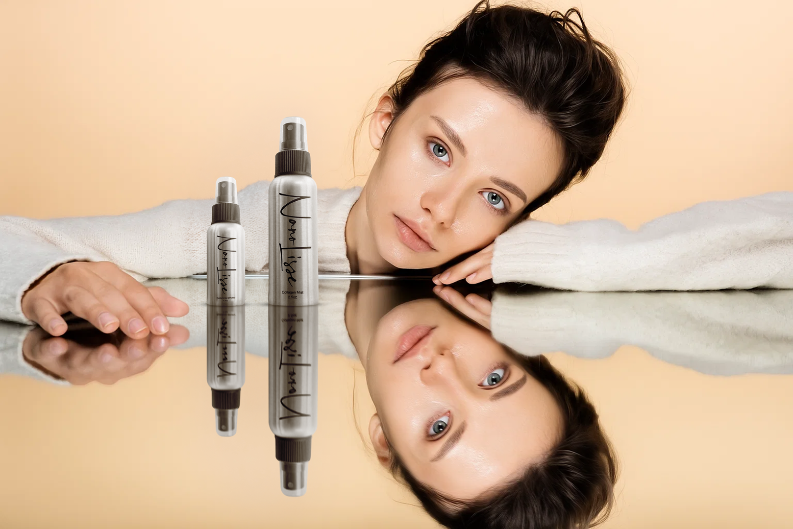 Woman resting beside NanoLisse collagen mist bottles on reflective surface, highlighting skincare hydration and glow for redness-prone skin.