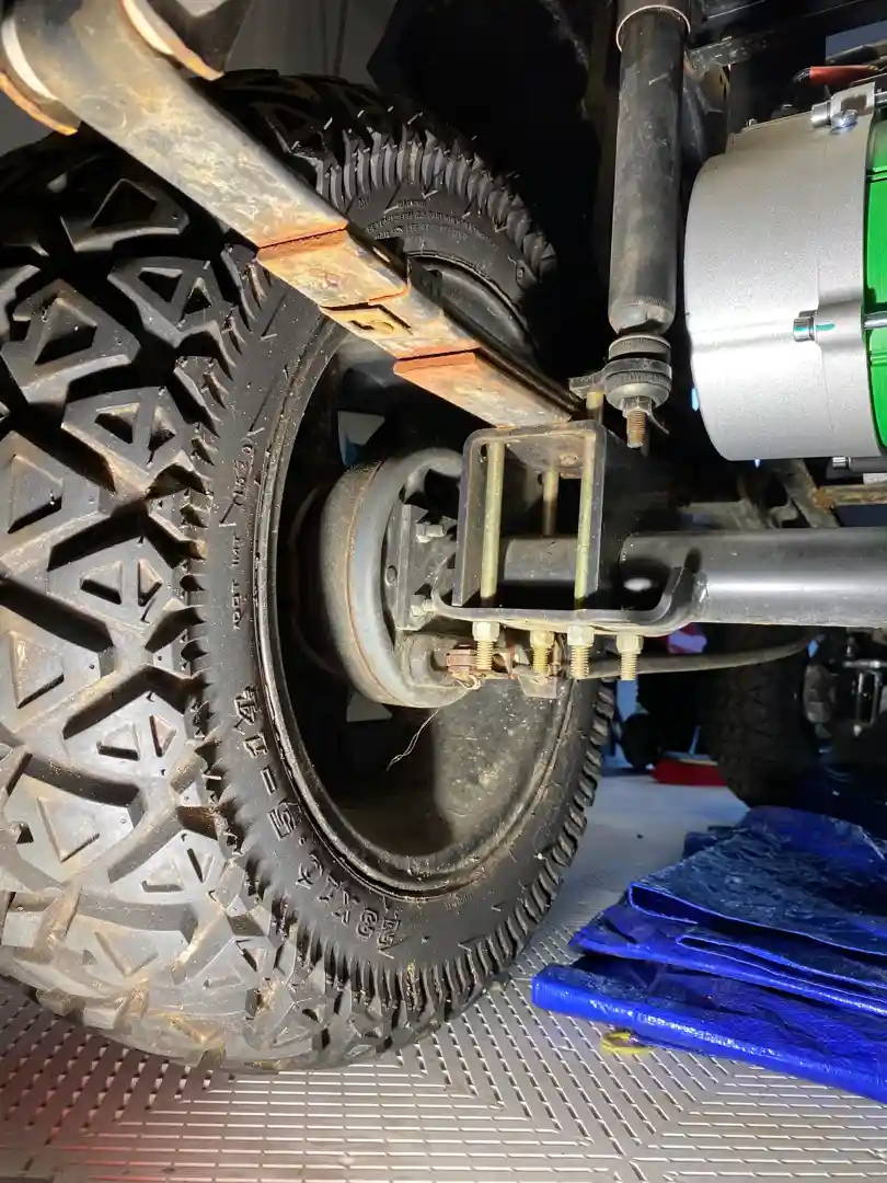 golf cart undercarriage with labels pointing to leaf springs, shock absorbers, and bushings - Golf cart suspension upgrade golf cart undercarriage with labels pointing to leaf springs, shock absorbers, and bushings - Golf cart suspension upgrade