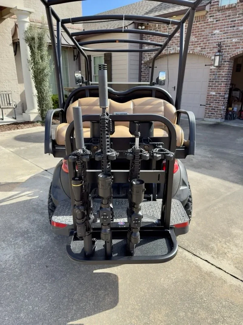 golf cart rear grab bar with gun rack mounted on the back