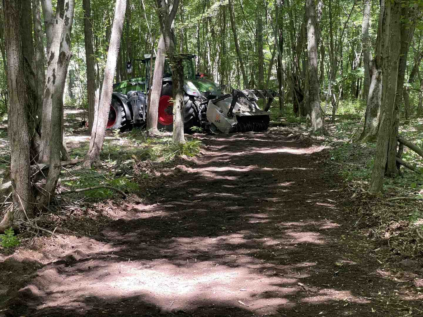 Community meeting discussing a local map with diverse participants - wildfire mitigation for Fort Wayne area