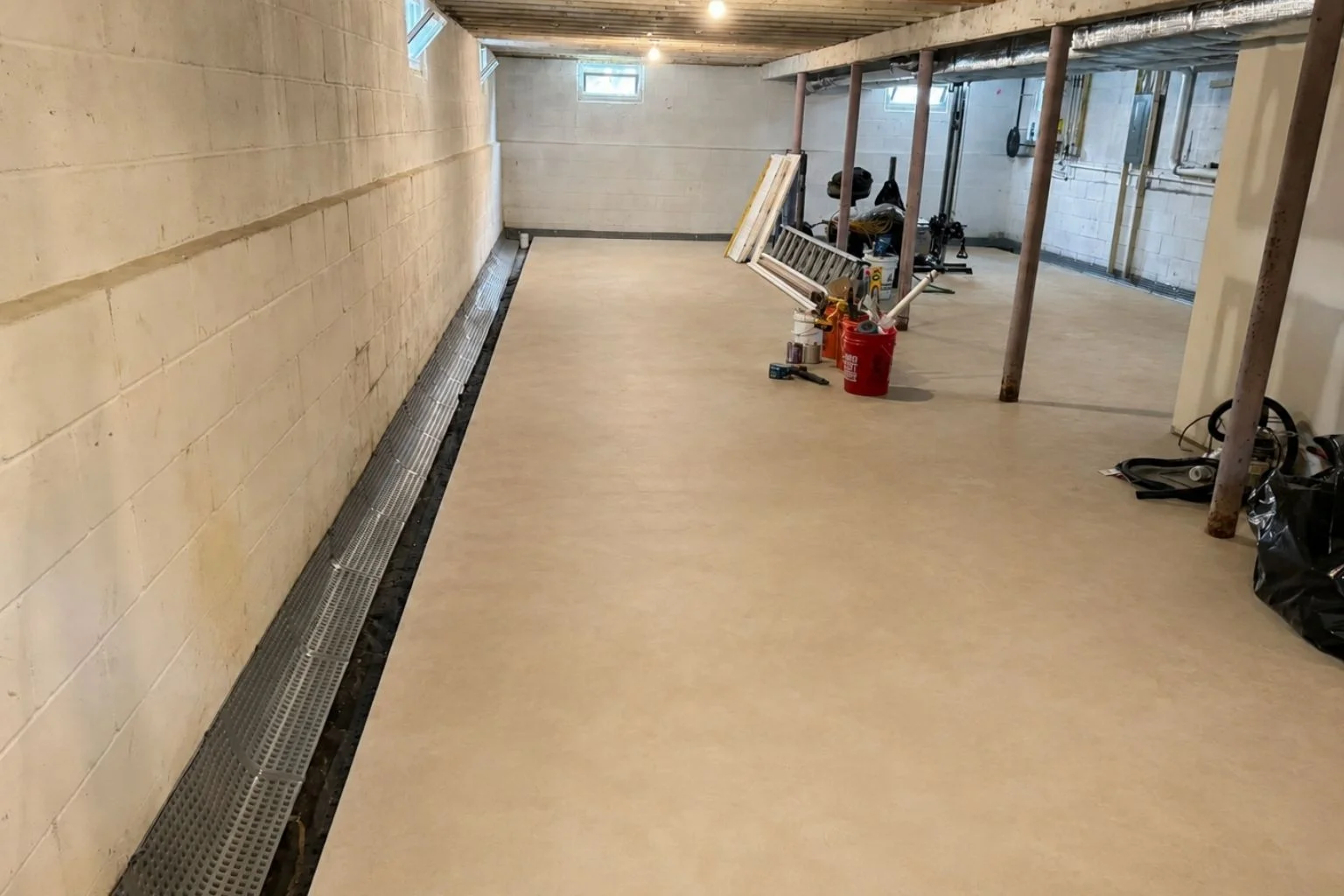 user-inserted Basement french drain system for waterproofing in NJ