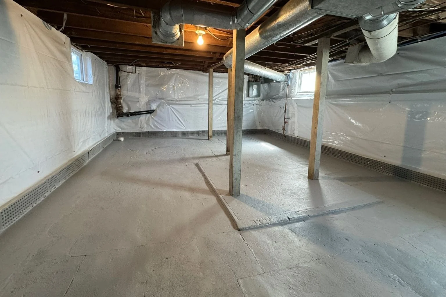 user-inserted Finished dry basement with vapor barrier after NJ waterproofing.