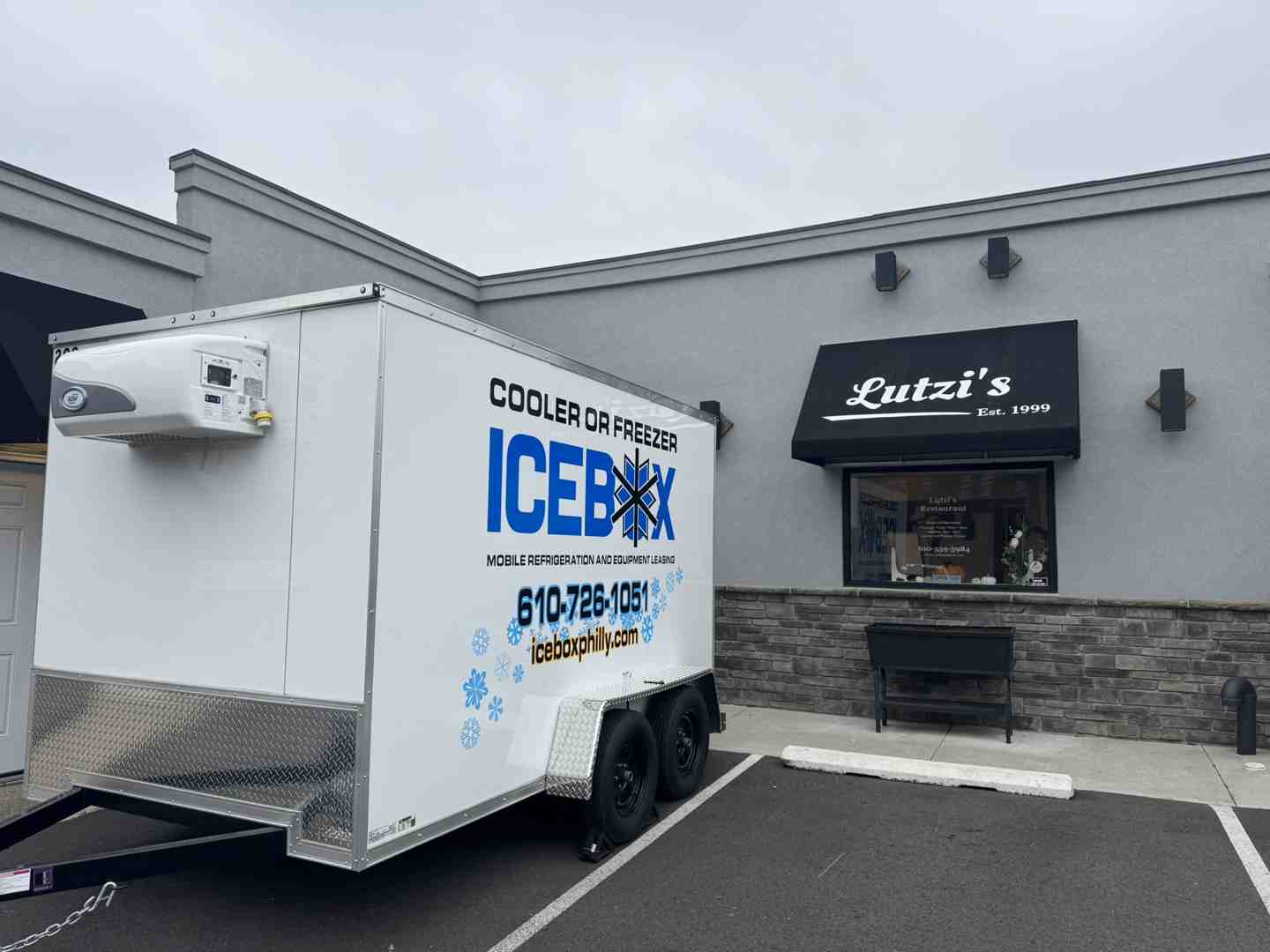 delivered mobile walk-in freezer trailer set up at commercial kitchen site