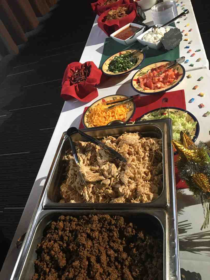 Rudy's Smokehouse BBQ selection and sides display Rudy's Smokehouse BBQ selection and sides display