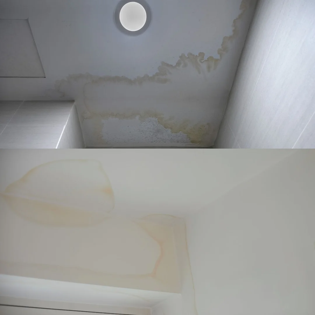Ceiling with visible water stains and discolouration, showing potential water damage or leaks.