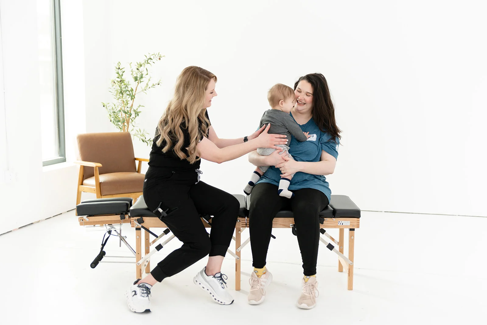 mother comfortably nursing baby in a warm supportive setting