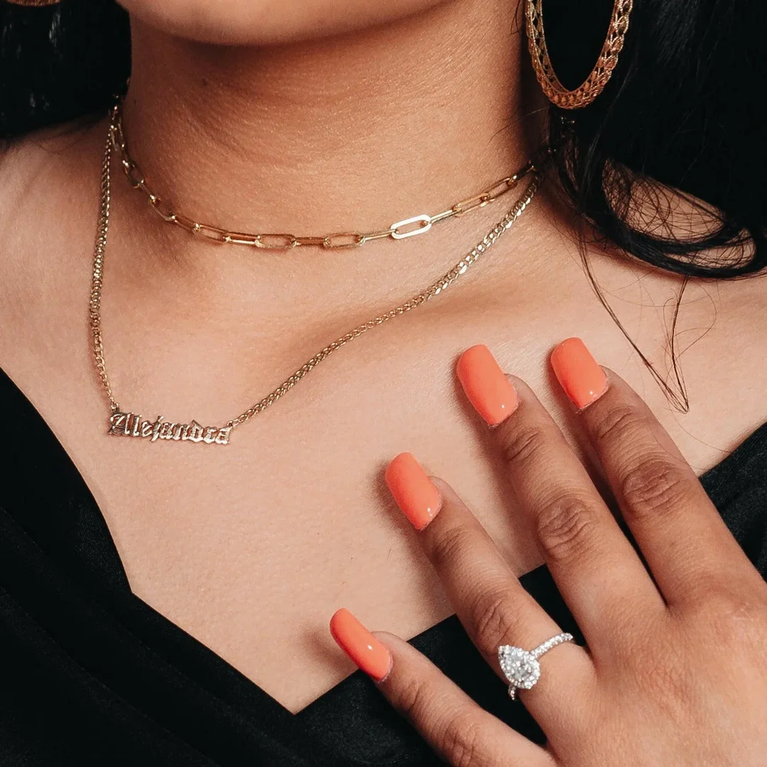 Trending women's solid gold link chains and layered necklace styles