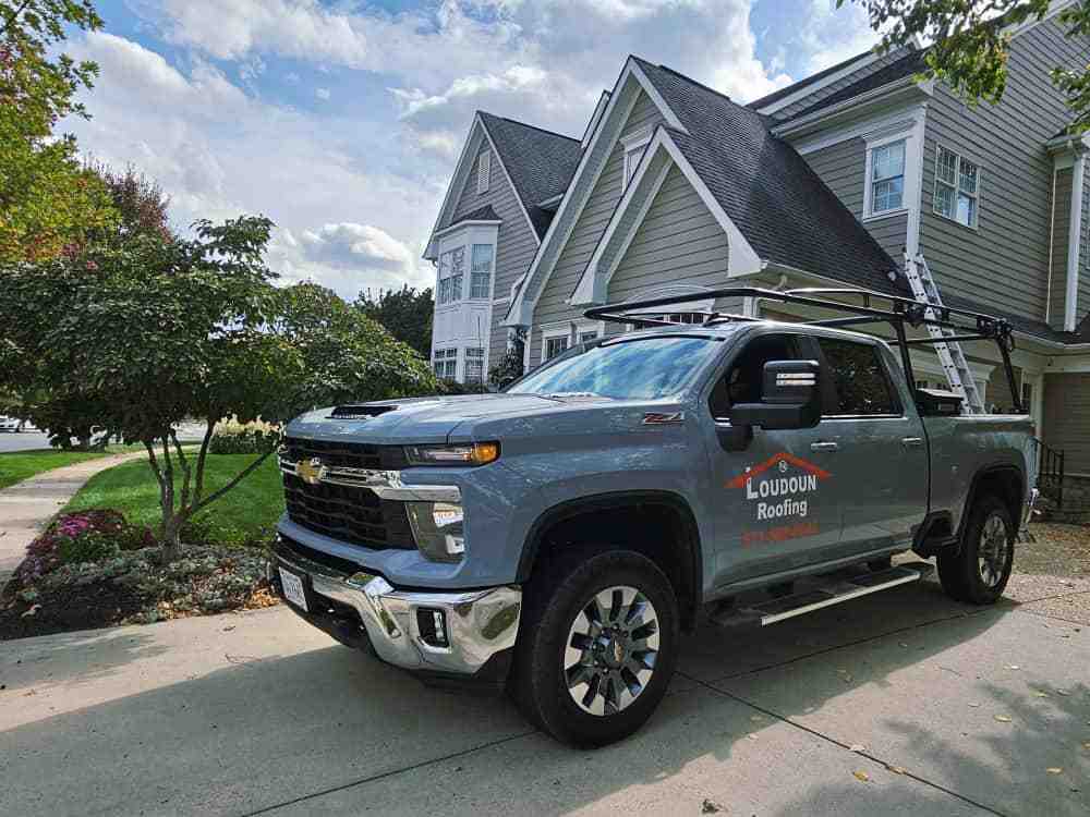 Certified roofer's truck with licensing information - roofing repair services leesburg va