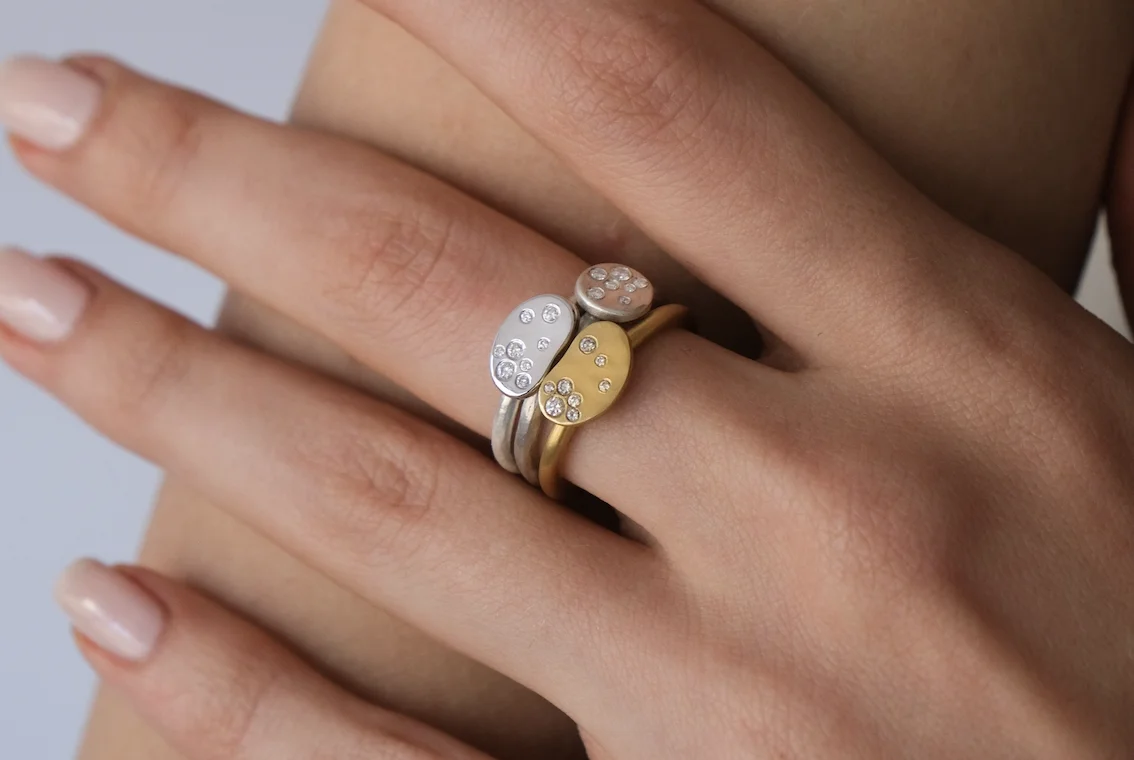 Collection of diamond, colored gemstone, and textured gold rings Collection of diamond, colored gemstone, and textured gold rings