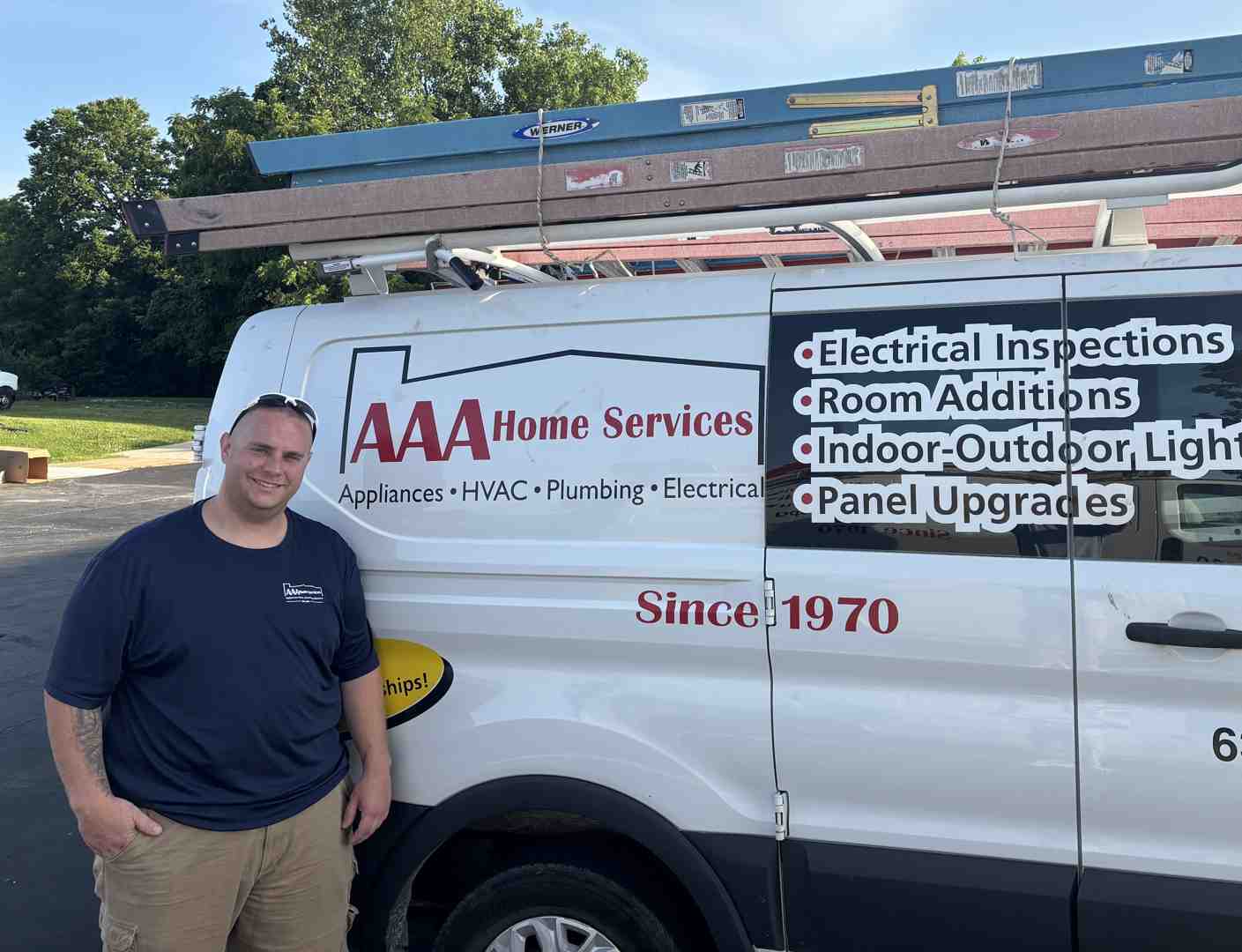 satisfied homeowner shaking hands with electrical technician - electrical repairs near me