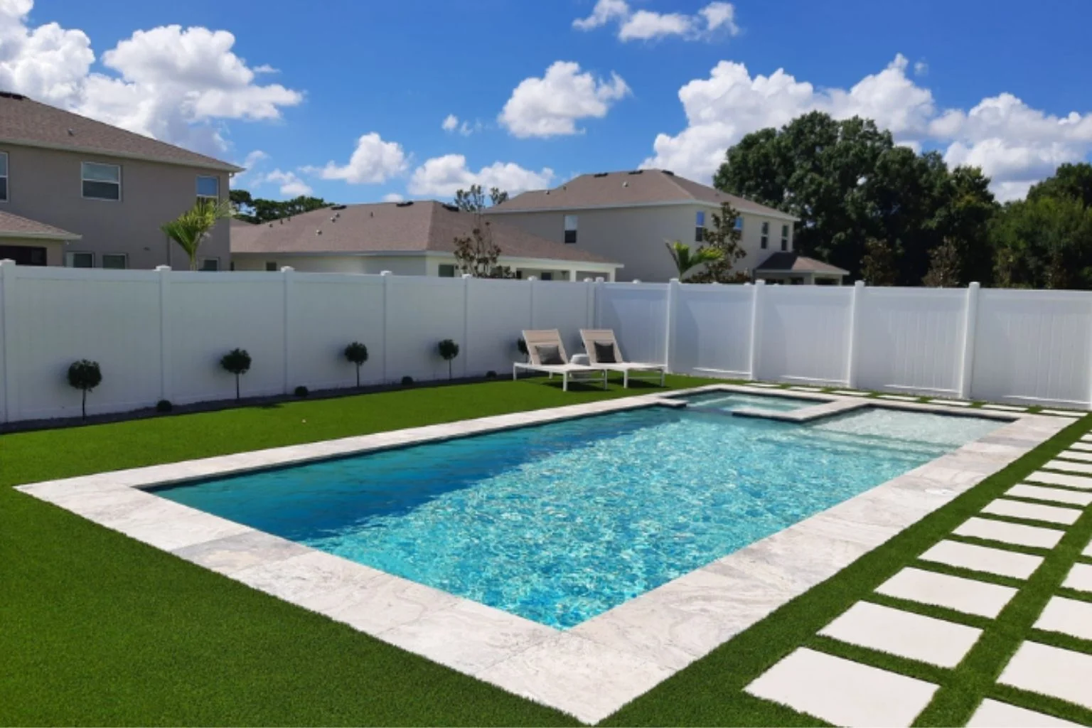 Modern rectangular pool remodel after a home sale.