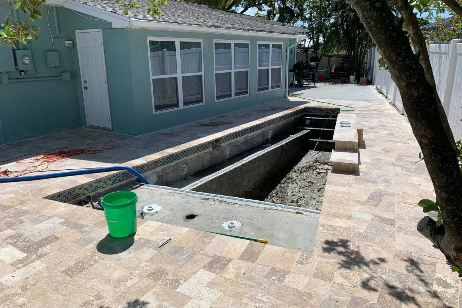 Tampa pool remodel in progress, showing ongoing construction for a home value increase.