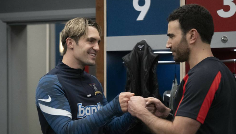 A Leader Showing Empathy To A Team Member - Ted Lasso Management Lessons A Leader Showing Empathy To A Team Member - Ted Lasso Management Lessons