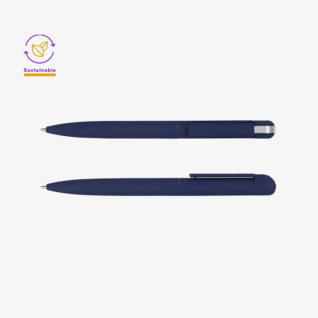 Eco friendly promotional pens made from bamboo and wheat straw on a wooden desk.