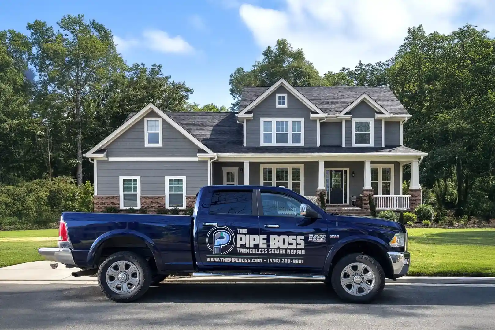 clean, professional Pipe Boss van with clear branding - plumbers near me with cameras