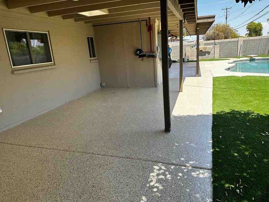 A family enjoying a beautiful, clean, and safe Galaxy-coated patio area. - patio coatings near me A family enjoying a beautiful, clean, and safe Galaxy-coated patio area. - patio coatings near me