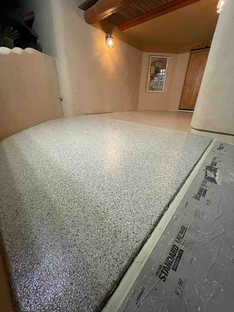 A pristine, durable commercial floor in a Phoenix showroom, reflecting overhead lights. - concrete coatings near me A pristine, durable commercial floor in a Phoenix showroom, reflecting overhead lights. - concrete coatings near me