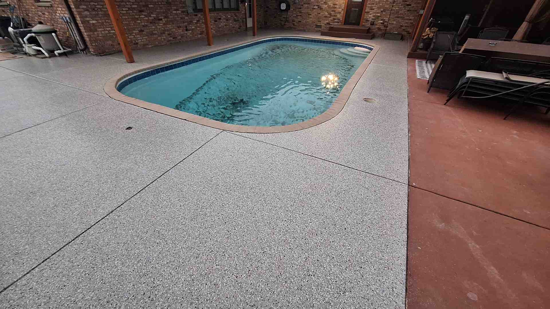 professional crew applying polyaspartic coating - pool deck renovation cost professional crew applying polyaspartic coating - pool deck renovation cost