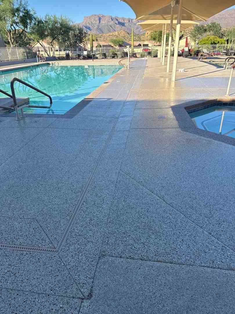 Gold Canyon, Arizona pool deck, family enjoying polyaspartic pool deck - pool deck renovation cost Gold Canyon, Arizona pool deck, family enjoying polyaspartic pool deck - pool deck renovation cost