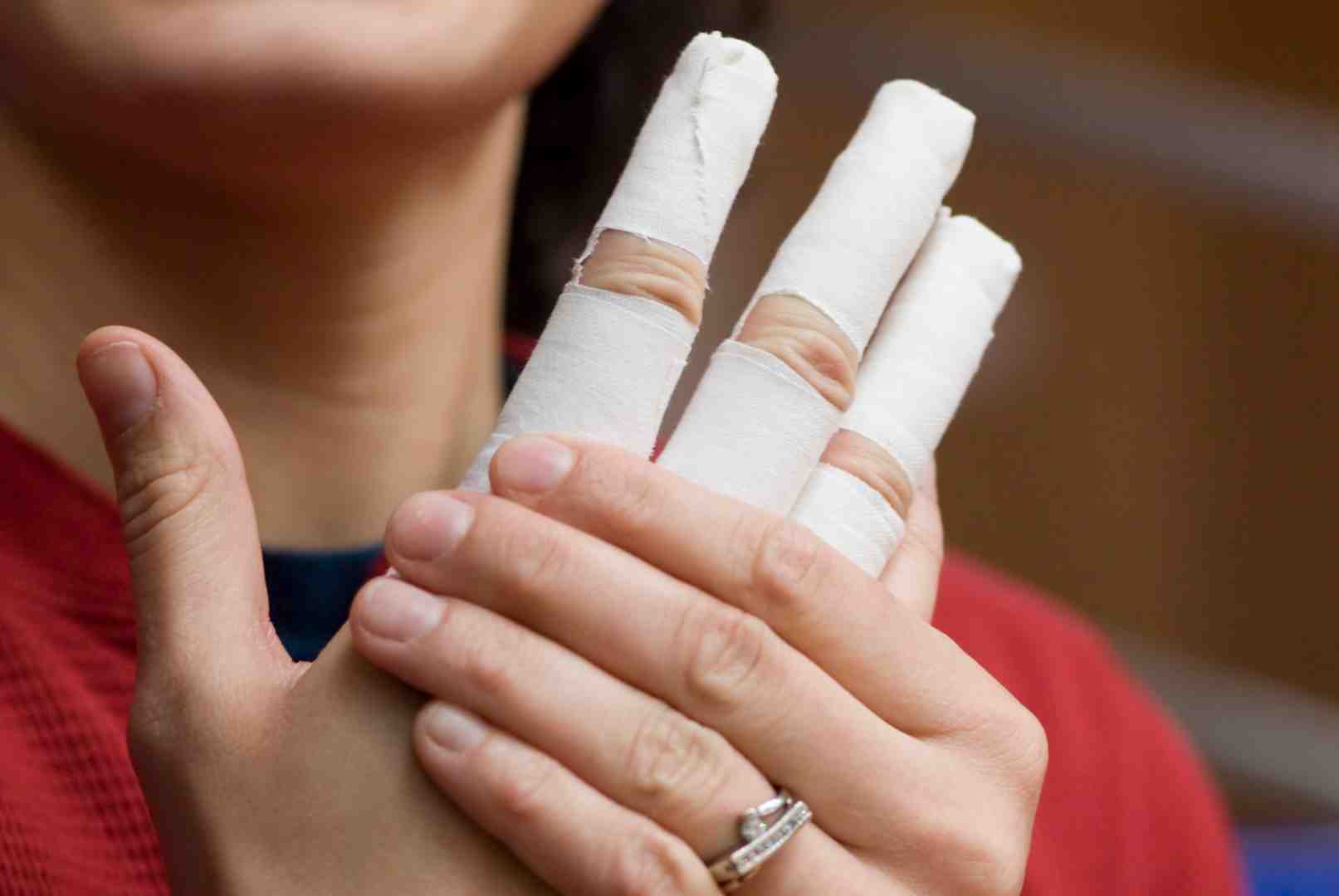 volleyball player fingers taped - sports tape for fingers