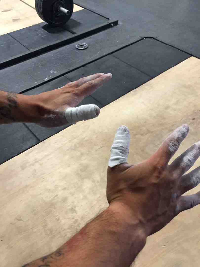 athletic tape for hands - athletic tape for hands
image shows an athlete using REFLEX Stretch tape for taping thumbs during olympic weightlifting