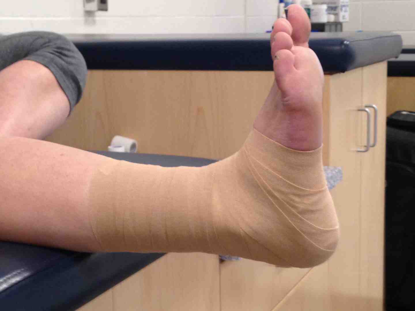 applying pre-wrap - achilles tendon taping applying pre-wrap - achilles tendon taping