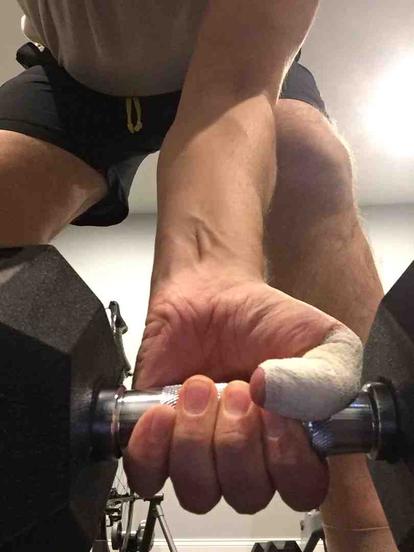 Step-by-step hand taping demonstration showing proper skin preparation, anchor placement, and tape application techniques - athletic tape for hands
