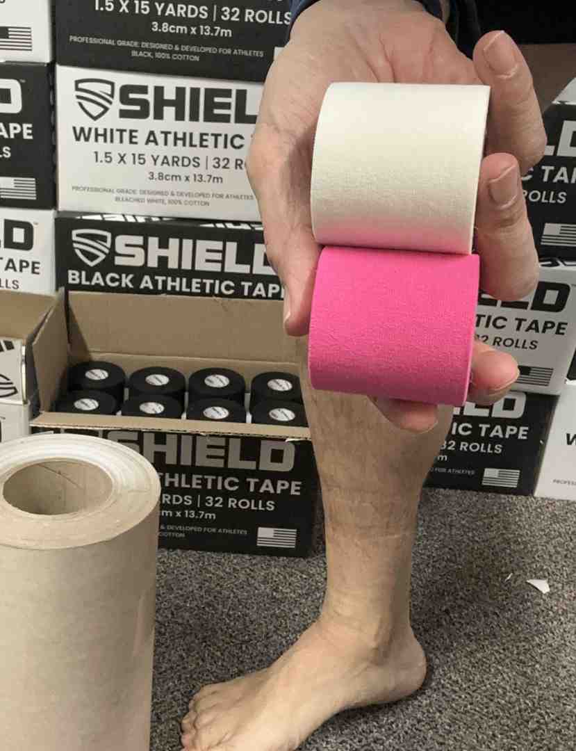 Different types of athletic tape including rigid white tape, elastic kinesiology tape, and zinc oxide tape with their specific applications for soccer ankle taping - ankle taping soccer