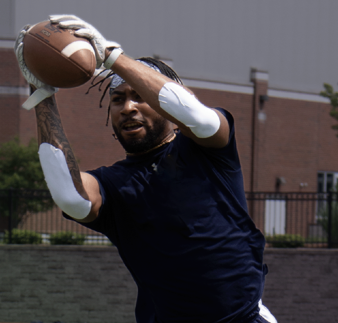 player's arm with turf tape - athletic tape for football players player's arm with turf tape - athletic tape for football players