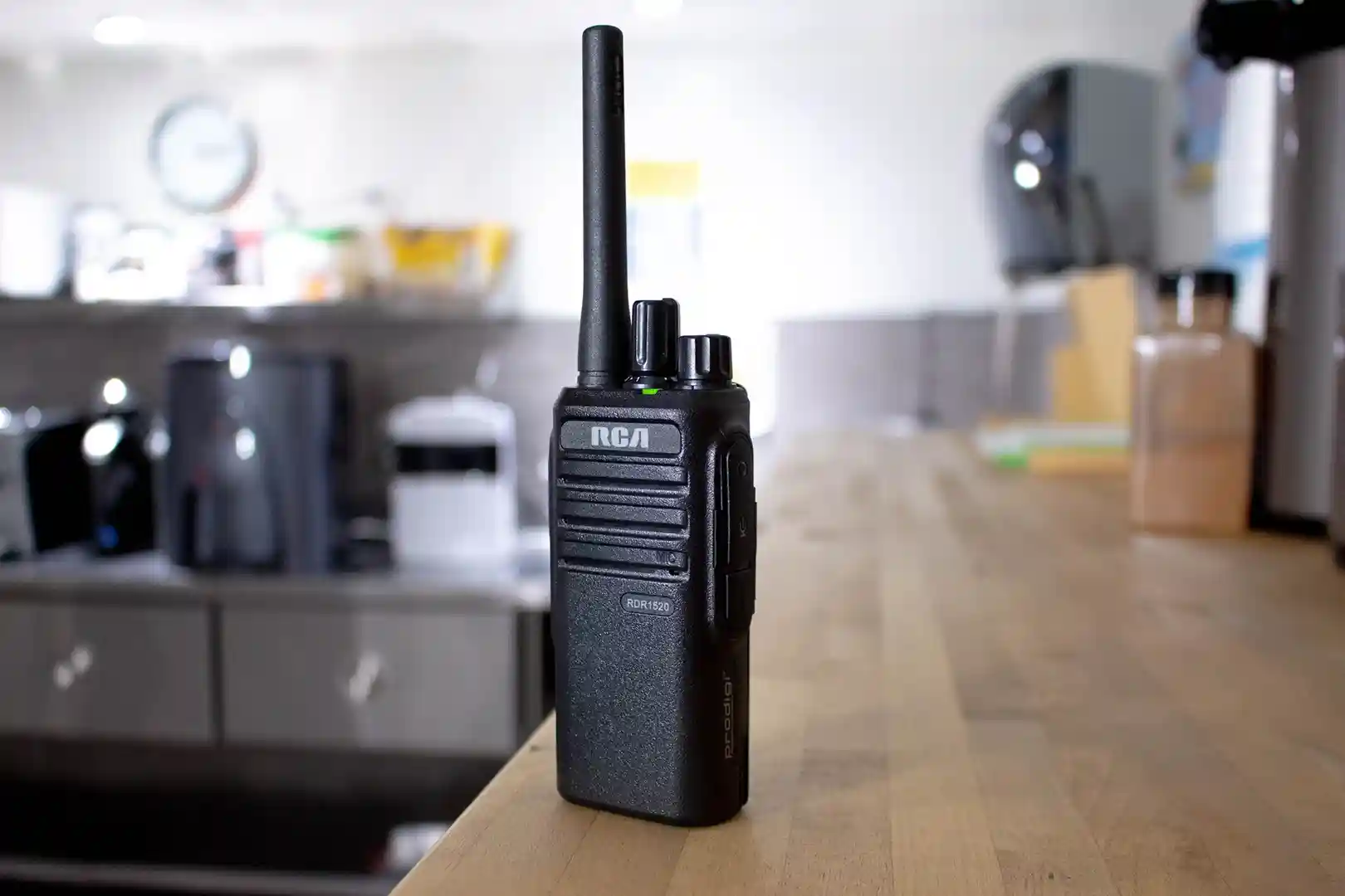 assorted retail radios in charging bank - retail radios